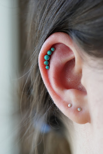 Explore husker tattoo ideas, creative tattoo ideas in San Jose, available at Make Me Holey Body Piercing