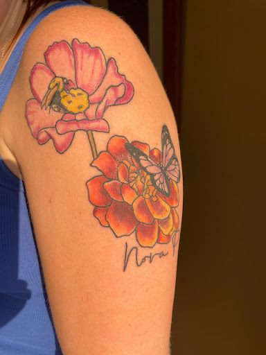 Find lesbian couple tattoos ideas for your next unique tattoo in Greenwood at Perception Body Modification Studio