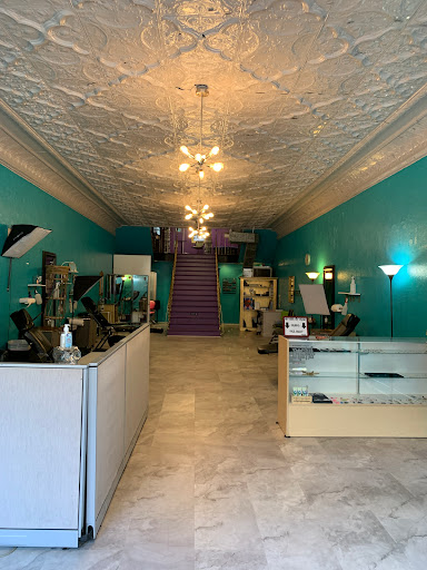 Explore cover up tattoo ideas female back, creative tattoo ideas in Washington, available at Rockstar Tattoo and Piercing Studio LLC