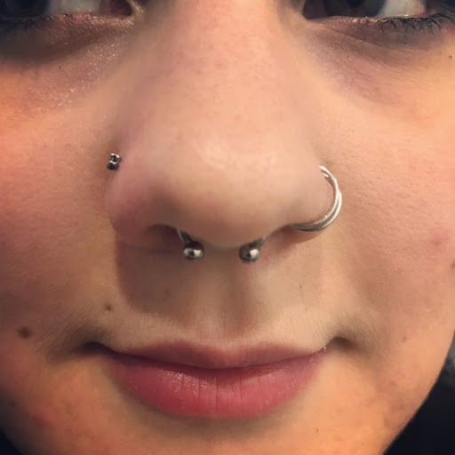 Explore trust no one tattoo ideas, creative tattoo ideas in New York, available at Cherry Bomb Tattoo & Piercing Studio - Walk-Ins Welcome
