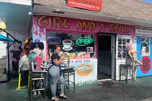 Girl And A Grill image