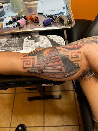 Explore hand tattoo ideas for men, creative tattoo ideas in Las Cruces, available at Real INX Fine Art- Tattoo Piercing & Art Studio