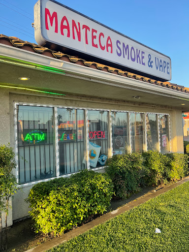 Cigarette & Gift Shop, 1336 W Yosemite Ave, Manteca, CA 95337, USA, 