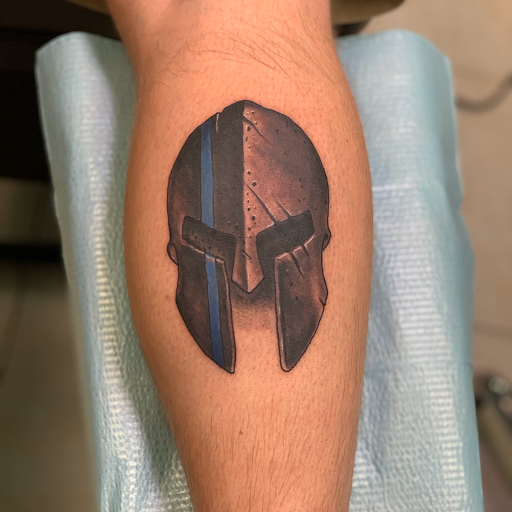 Explore memorial cross tattoo ideas, creative tattoo ideas in Ocala, available at The Tattoo Gallery of Ocala LLC