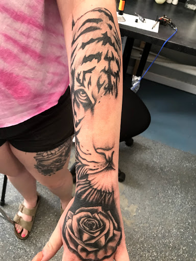 Explore ironman tattoo ideas, creative tattoo ideas in Muncie, available at The Tattoo Studio