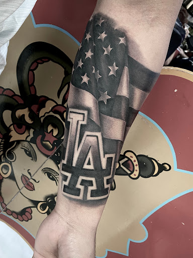 Explore floral tattoo filler ideas, creative tattoo ideas in Honolulu, available at Sacred Art Tattoo Waikiki