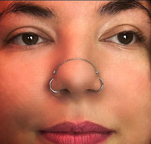 Explore bad omens tattoo ideas, creative tattoo ideas in Venice, available at Ink Monkey Tattoo and Piercing