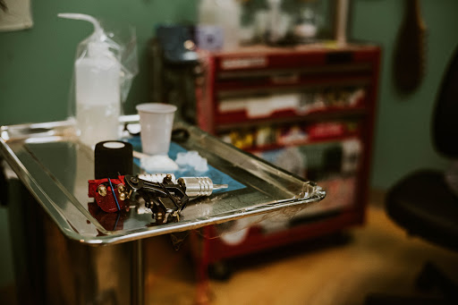 Find good vs evil tattoo ideas for your next unique tattoo in Albany at Dead Presidents Lounge