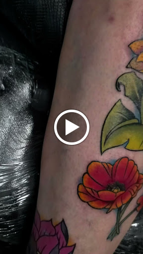 Find charm bracelet tattoo ideas for your next unique tattoo in Muskogee at Spurlocks Emporium