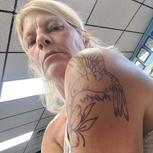 Explore japanese snake tattoo ideas, creative tattoo ideas in Elyria, available at Chronic Tattoo