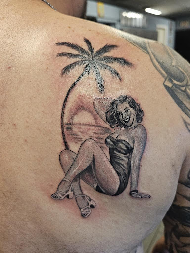 Explore strong woman tattoo ideas, creative tattoo ideas in Palm Harbor, available at Angry Owl Tattoo and Piercing