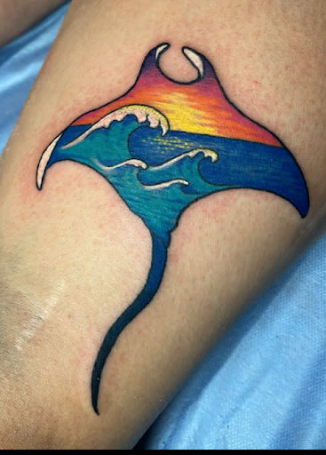 Explore calf tattoo ideas for men, creative tattoo ideas in Pahoa, available at Electric Jungle Tattoo