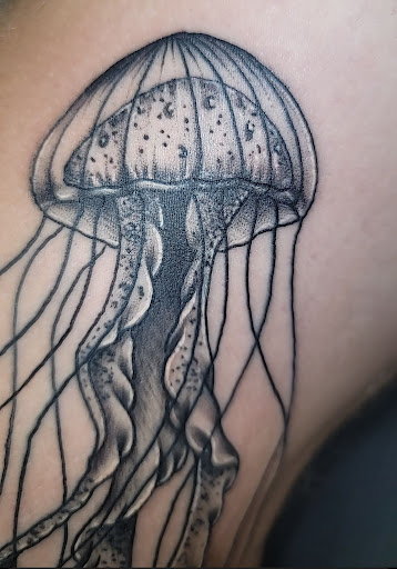 Explore cherub angel tattoo ideas, creative tattoo ideas in Lawrenceburg, available at Yellow Rose Tattoo