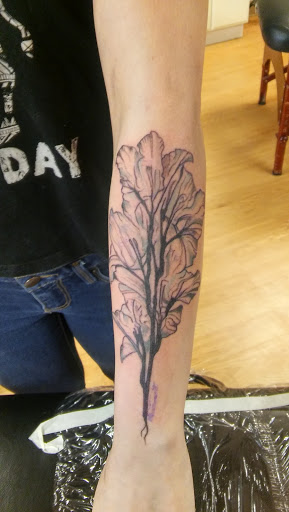 Explore tattoo of son's name ideas, creative tattoo ideas in La Crosse, available at La Crosse Tattoo