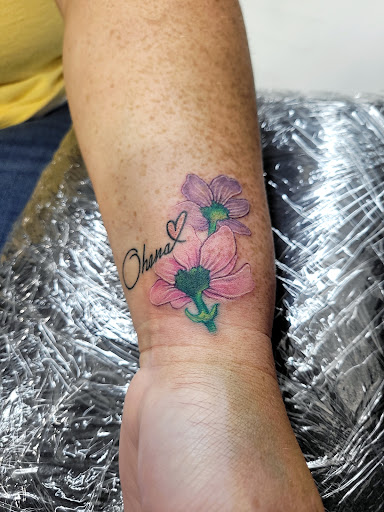 Explore energy tattoo ideas, creative tattoo ideas in Benton, available at Spectrum Tattoo