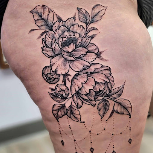 Explore wrist tattoo ideas for females, creative tattoo ideas in Shelbyville, available at The Copper Phoenix