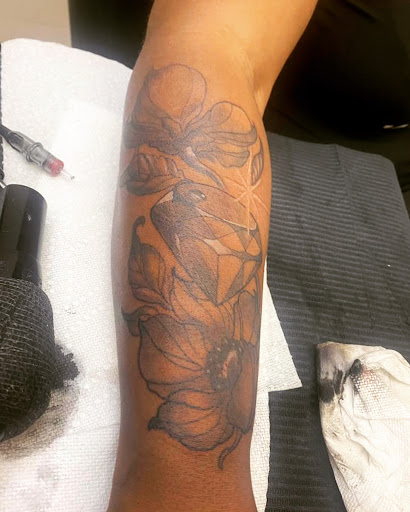 Explore back hand tattoo ideas, creative tattoo ideas in Memphis, available at Inkatsuki Tattoos Art Studio