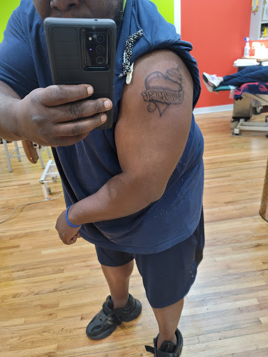 Find flower thigh tattoo ideas for your next unique tattoo in Shakopee at Crazy Lady Ink LLC