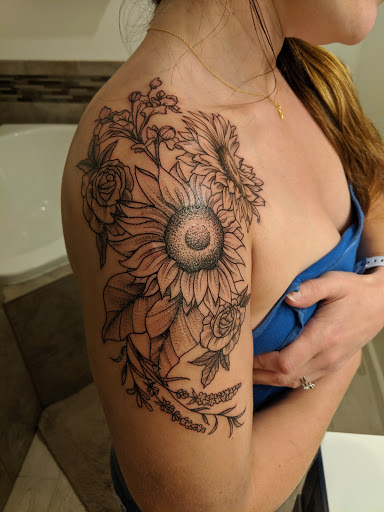 Explore camera tattoo ideas, creative tattoo ideas in Oklahoma City, available at Black Magic Tattoo