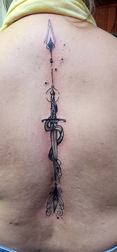 Explore back arm tattoo ideas, creative tattoo ideas in Phenix City, available at Skin Traditions Tattoo Studio