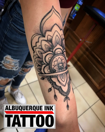 Explore barber pole tattoo ideas, creative tattoo ideas in Albuquerque, available at Albuquerque Ink Tattoo