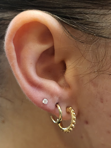 Explore book dragon tattoo ideas, creative tattoo ideas in Scottsdale, available at Club Tattoo