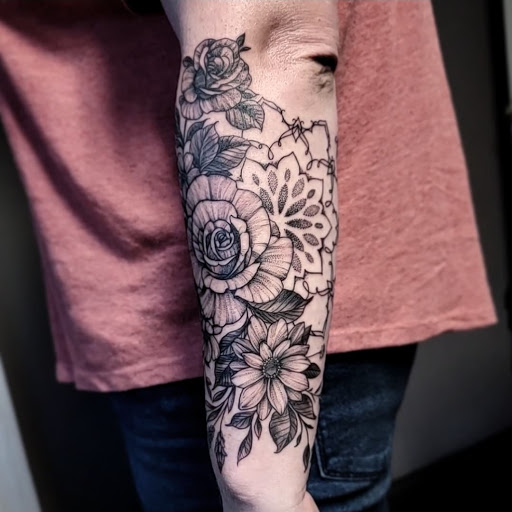 Explore alpha tattoo ideas, creative tattoo ideas in Asheboro, available at Wonderland Tattoo