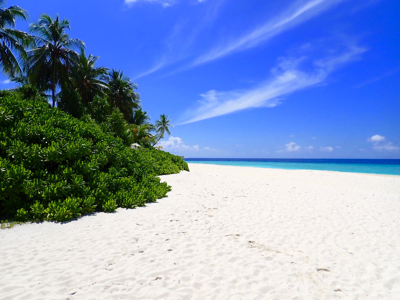 Foto von Robinson Resort Strand mit geräumige küstenlinie