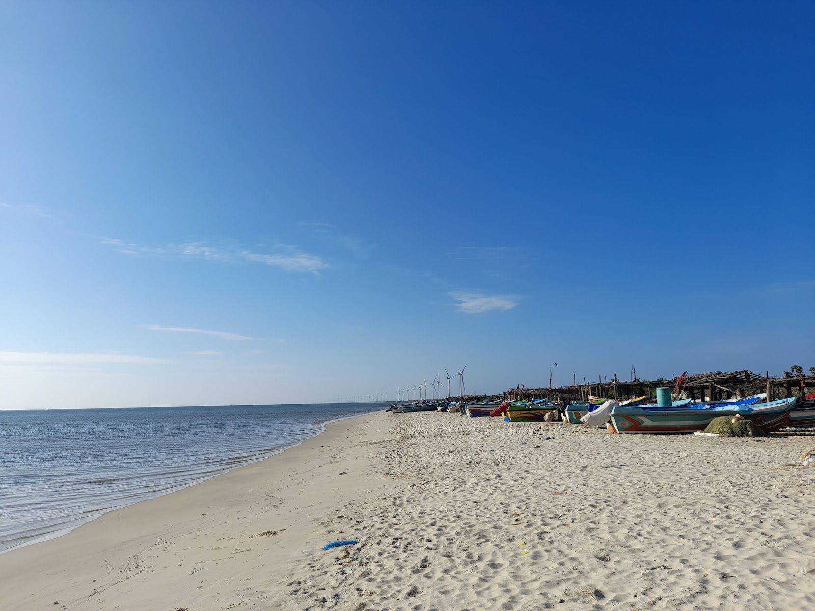 Foto von Thalvupadu Beach mit beiger sand Oberfläche