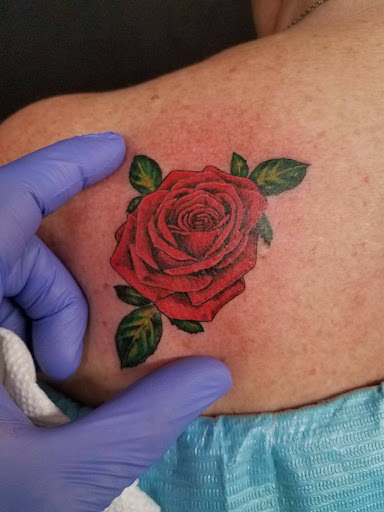 Explore men's behind the ear tattoo ideas, creative tattoo ideas in Toms River, available at Jersey Sure Lines Tattoo