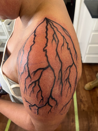 Explore mens calf tattoo ideas, creative tattoo ideas in Rogers, available at Ink Solutions Tattoo