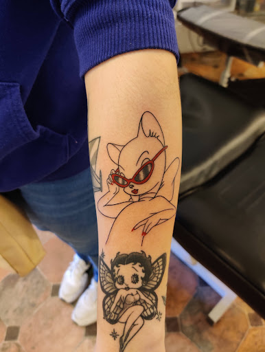 Find christmas tattoo ideas for your next unique tattoo in Hebron at Explosive Ink Tattoo