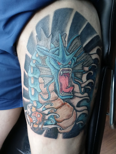 Explore navy seal tattoo ideas, creative tattoo ideas in Kannapolis, available at Ink Station Tattoo Studio