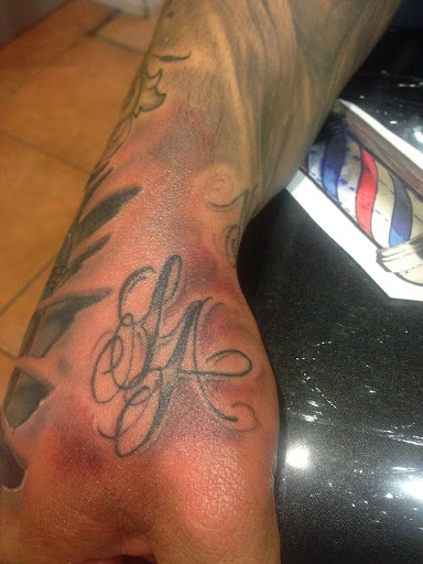 Explore male inner bicep tattoo ideas, creative tattoo ideas in Los Angeles, available at Tinta Rebelde hardcore tattoo