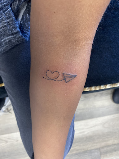 Explore semicolon tattoo ideas for females, creative tattoo ideas in Lombard, available at New Hope Tattoo