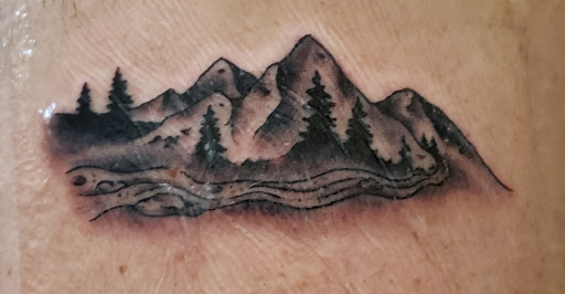 Find sakura tattoo ideas for your next unique tattoo in Glenwood Springs at Hole In the Wall Tattoos and Piercing, LLC