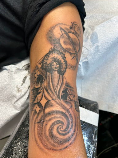 Explore women's spine tattoo ideas, creative tattoo ideas in Houston, available at 333 Tattoo Studio HTX