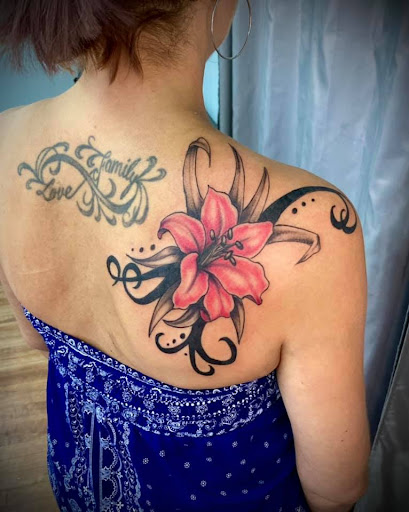 Explore butterfly cover up tattoo ideas, creative tattoo ideas in Hudson, available at Twisted Canvas Tattoo and Art Studio