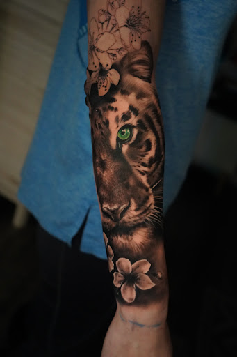 Explore cross tattoo ideas with meaning, creative tattoo ideas in Farmingville, available at LizArt Ink tattoo