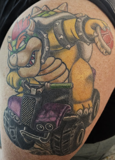 Explore man face tattoo ideas, creative tattoo ideas in Schaumburg, available at Atmosphere Tattoo Gallery - Schaumburg