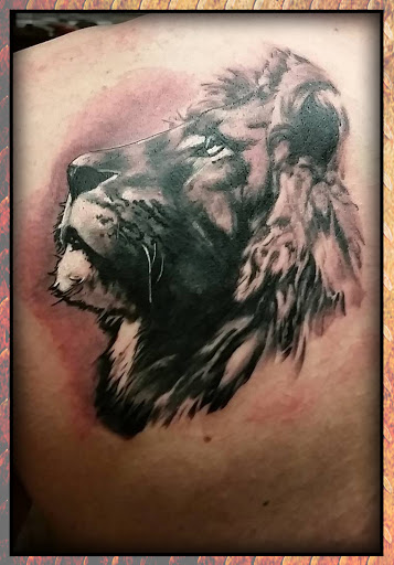 Explore outlaw tattoo ideas, creative tattoo ideas in Omaha, available at Eternal Tattoo & Body Piercing - Omaha