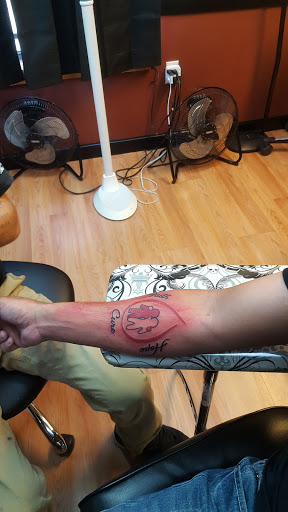 Explore country tattoo ideas for guys, creative tattoo ideas in Tarpon Springs, available at Legendary Custom Tattoos and Piercings