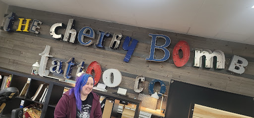 Explore moving tattoo ideas, creative tattoo ideas in Lees Summit, available at The Cherry Bomb Tattoo Co.