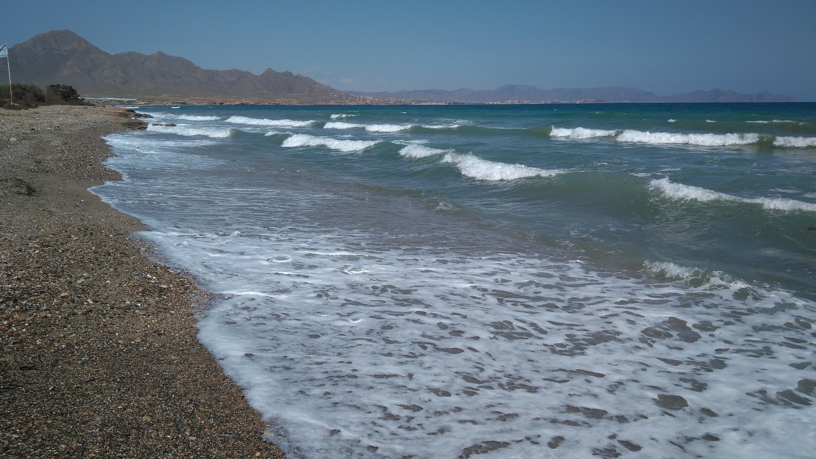 Foto de Playa de las Covaticas com long bay