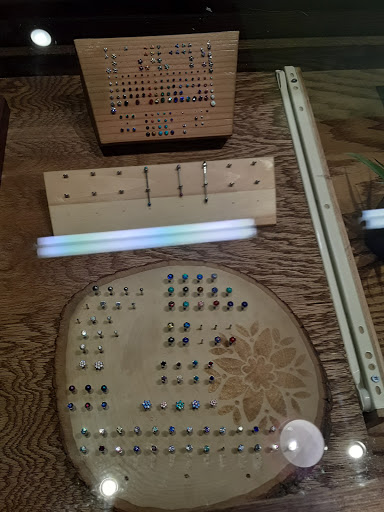 Explore hufflepuff tattoo ideas, creative tattoo ideas in Buffalo, available at CowPok Piercing Tattoo Gallery