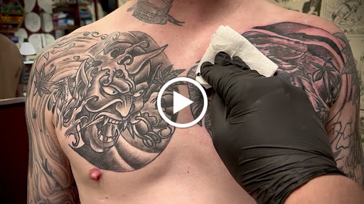 Explore koi sleeve tattoo ideas, creative tattoo ideas in Douglasville, available at Long Island Ink Tattoo & Piercing