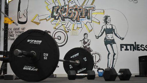 Upbeat Female CrossFit gym