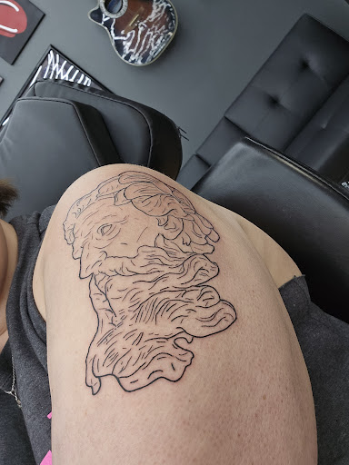 Explore medical doctor tattoo ideas, creative tattoo ideas in Orange, available at Empire Tattoo