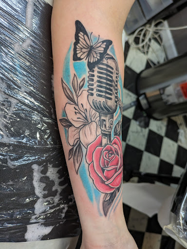 Explore traditional forearm tattoo ideas, creative tattoo ideas in Vidalia, available at Freedom Ink Tattoo