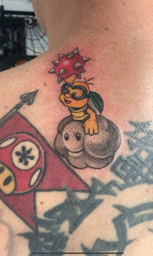 Explore name tattoo ideas on neck, creative tattoo ideas in El Paso, available at Santa Rosa Tattoo Studio